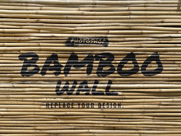 Brush on bamboo wall realistic mockup