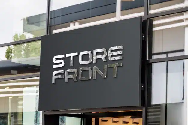 3d logo with reflective sheen on a storefront mockup Premium Psd