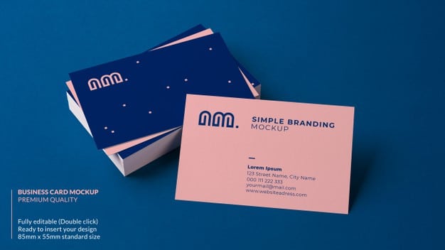 Business card mockup resting on a stack of cards Premium Psd