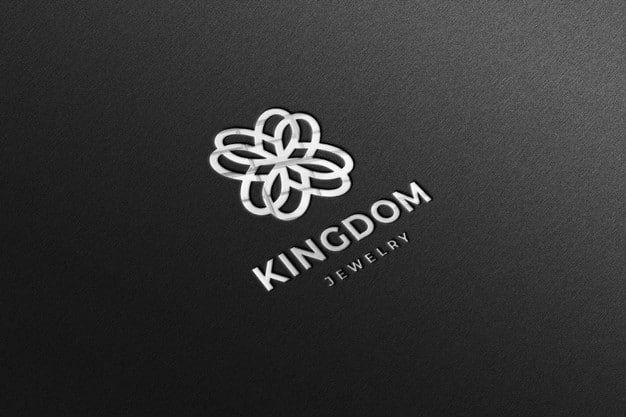 Luxury glossy silver logo mockup in black paper Premium Psd