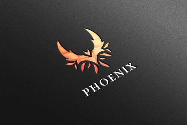 Phoenix logo mockup in black paper with reflection Premium Psd