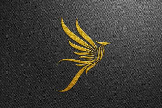 Phoenix logo mockup on black fabric - golden logo mockup Premium Psd