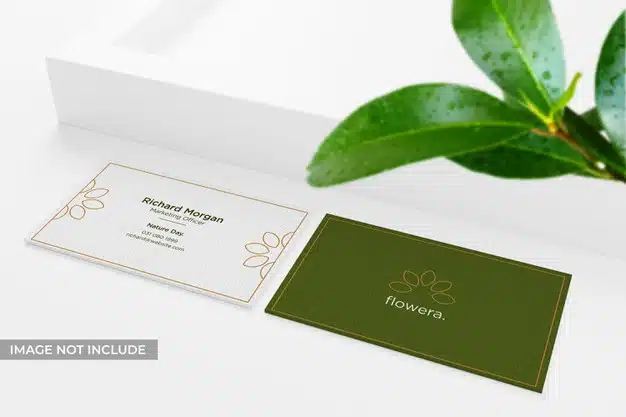 Realistic and clean business card mockup with leaves Premium Psd