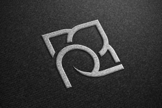 Realistic mockup of logo on black fabric Premium Psd