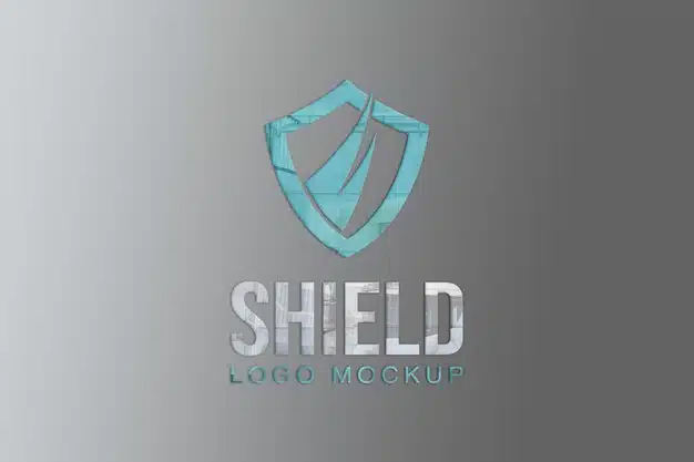 Shield logo mockup on wall Premium Psd
