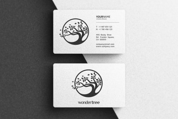 Simple logo mockup on white business card Premium Psd