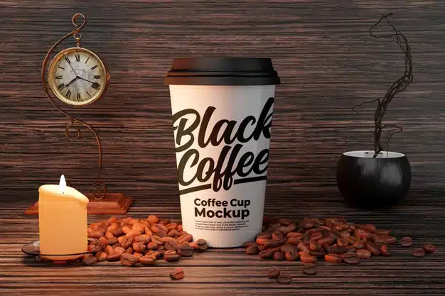 White coffee cup mockup with candle and coffee bean decorations Premium Psd