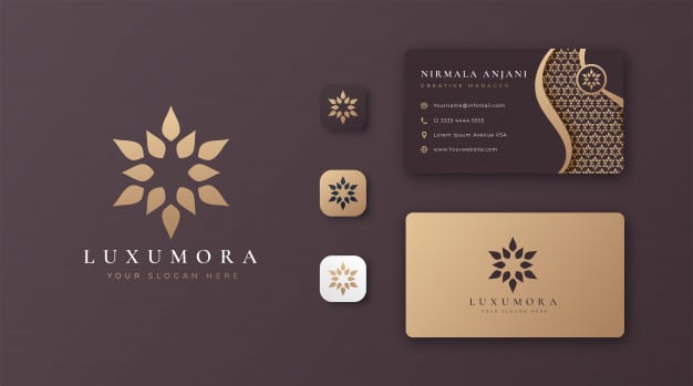 Luxury golden mandala logo with business card Premium Vector