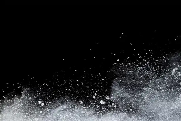 White powder explosion on black background Premium Photo