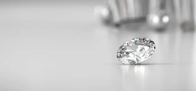 Shiny brilliant diamond placed on gradient background Premium Photo